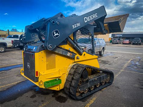 john deere 323 d skid steer track adjustment|john deere 323e high flow.